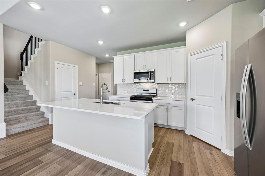 Photo is not of the actual home, but is an inspirational photo of builder’s model home and may depict options, furnishings, and/or decorator features that are not included.