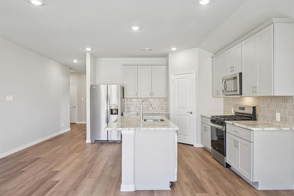 Photo is not of the actual home, but is an inspirational photo of builder’s model home and may depict options, furnishings, and/or decorator features that are not included.