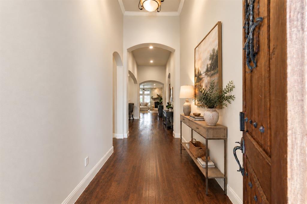 Welcoming entryway with hardwood floors