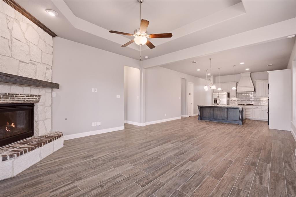 open concept living w high ceilings througout