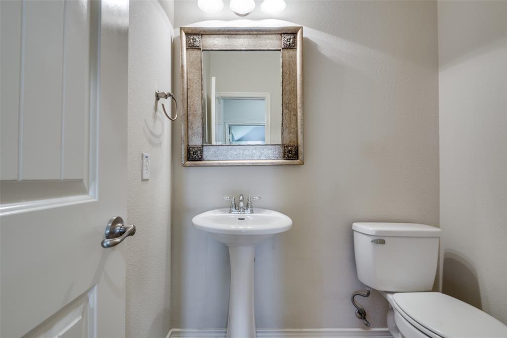 Half bath featuring toilet