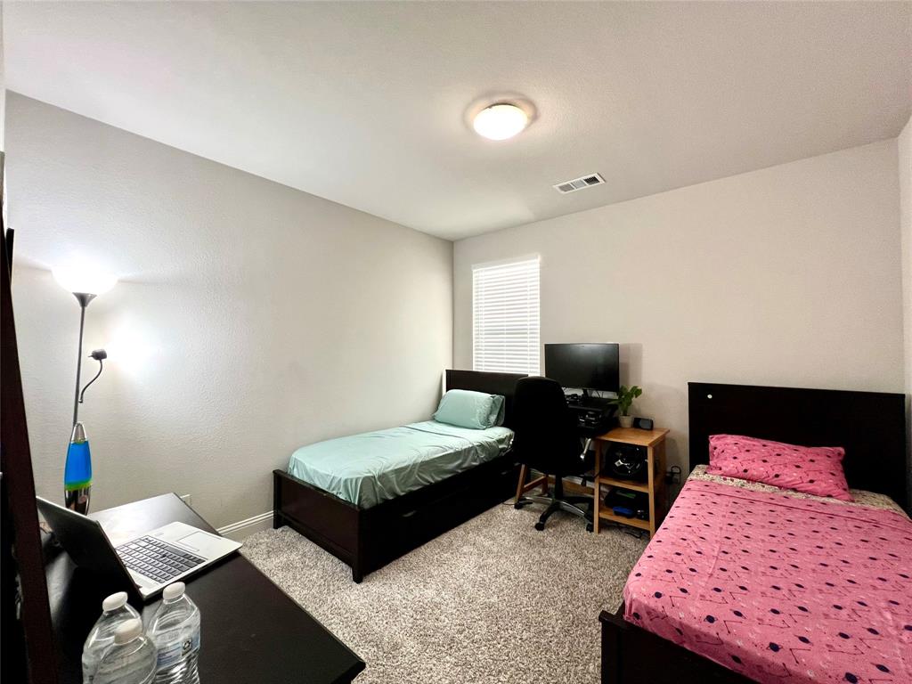 Bedroom with carpet