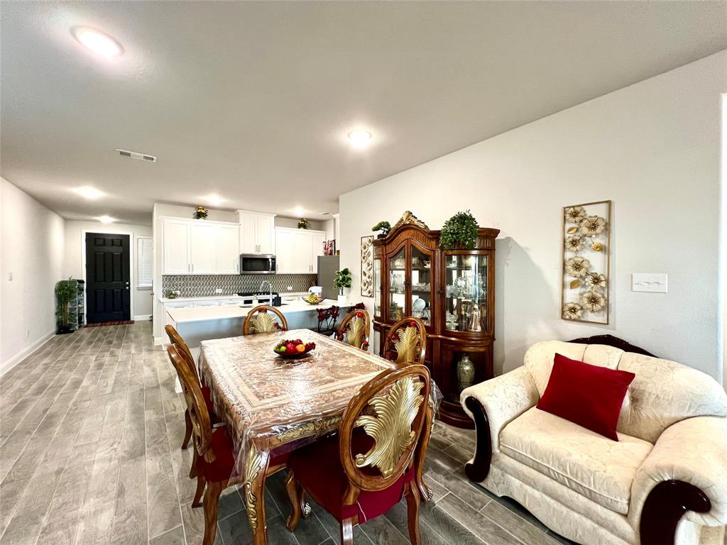 Dining space with light wood-type flooring