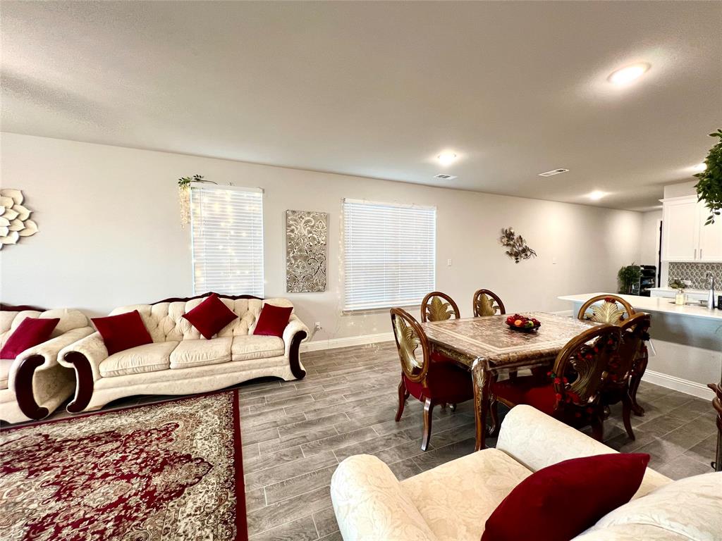 Living room with wood-type flooring