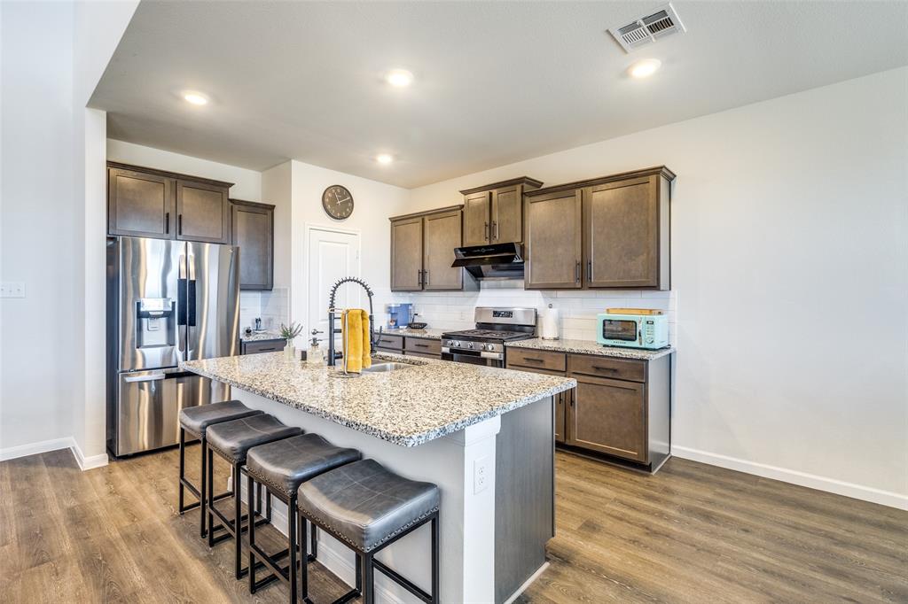 Open kitchen with an island and sitting. Non furnished but some furniture is negotiable or case by case. Open kitchen with an island and sitting. Non furnished but some furniture is negotiable or case by case.