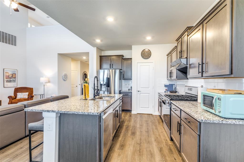 Kitchen with gas cooktop, new range hood and a walk-in pantry.Non furnished but some furniture is negotiable or case by case. Kitchen with gas cooktop, new range hood and a walk-in pantry.Non furnished but some furniture is negotiable or case by case.