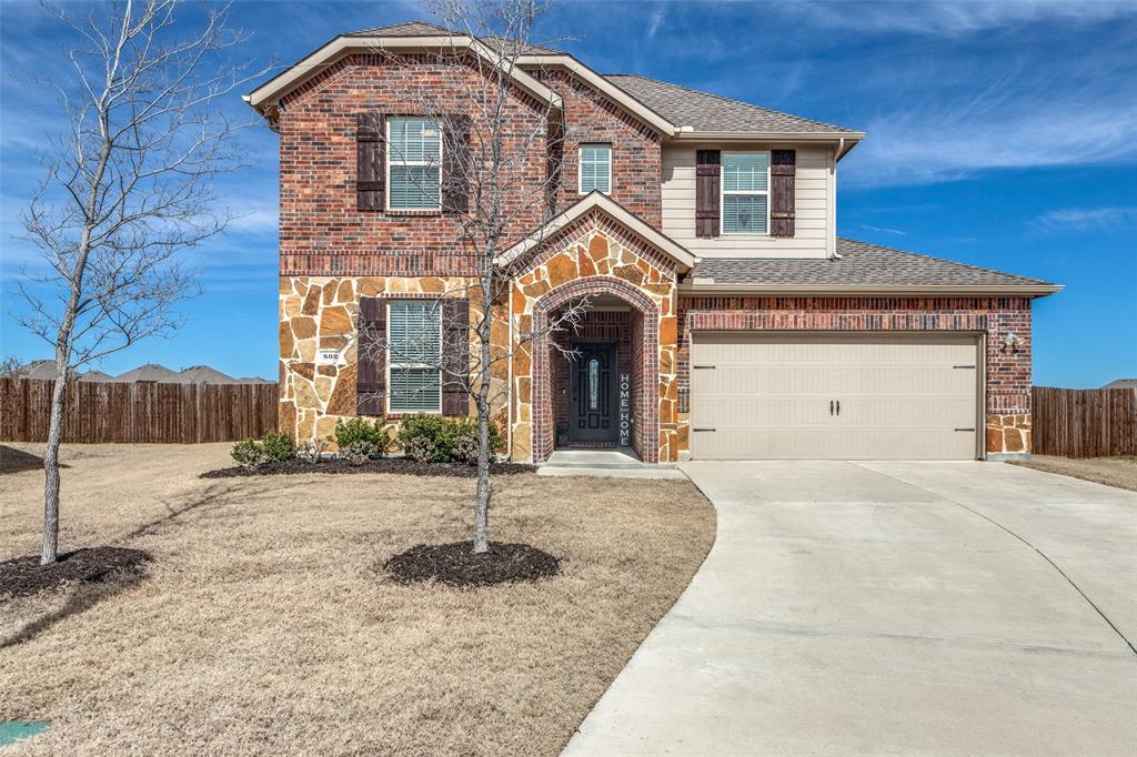Beautiful stonework on the front and large front yard with landscaping Beautiful stonework on the front and large front yard with landscaping
