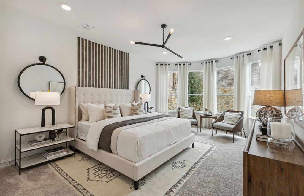 *Model Representation - Spacious owner's suite with private bath