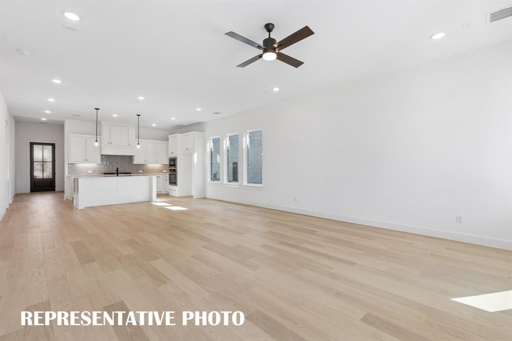 The open and flowing floor plan in our Chapelle II plan is an entertainer's dream home!  REPRESENTATIVE PHOTO