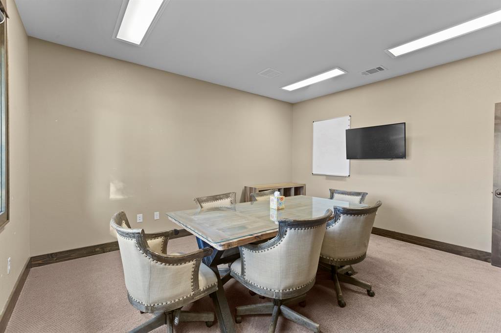 Neutral-toned interior featuring recessed lighting and wall-to-wall carpeting