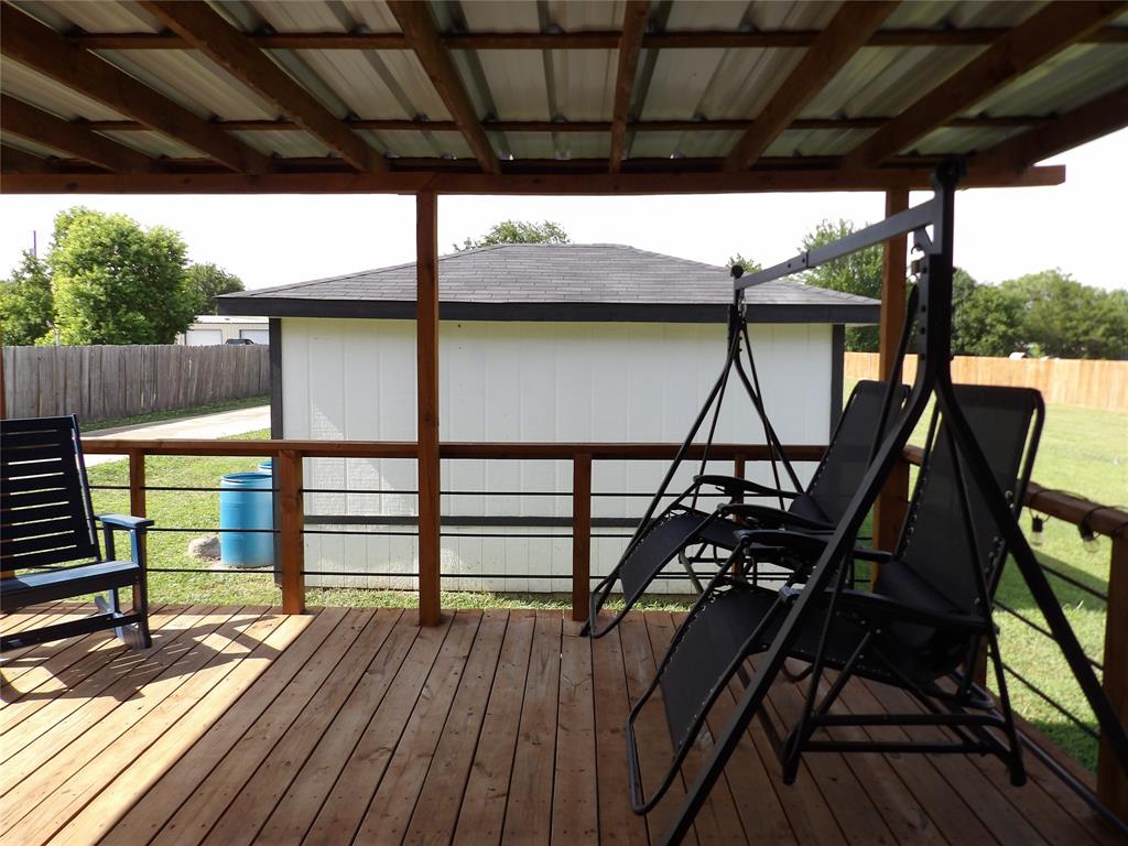 Back deck and 13 X 16 Storage Bld Back deck and 13 X 16 Storage Bld