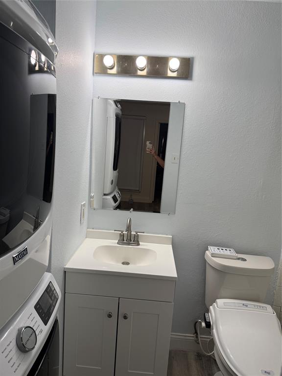 Bathroom with tub shower and vanity.