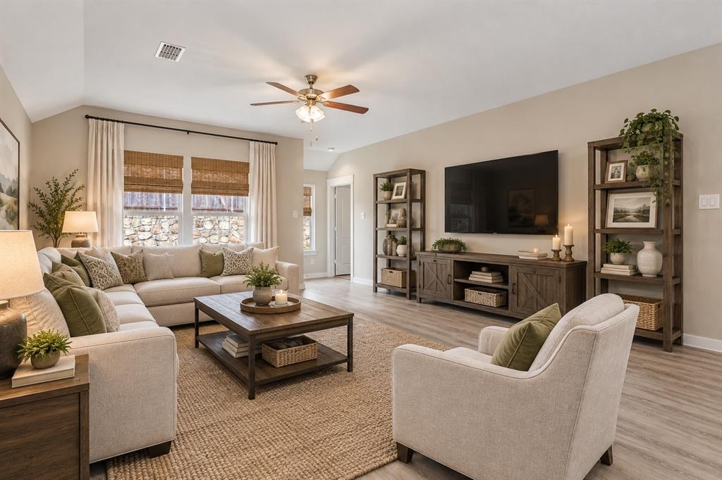 This Living  is Virtual staged.  Measurements may not be exact