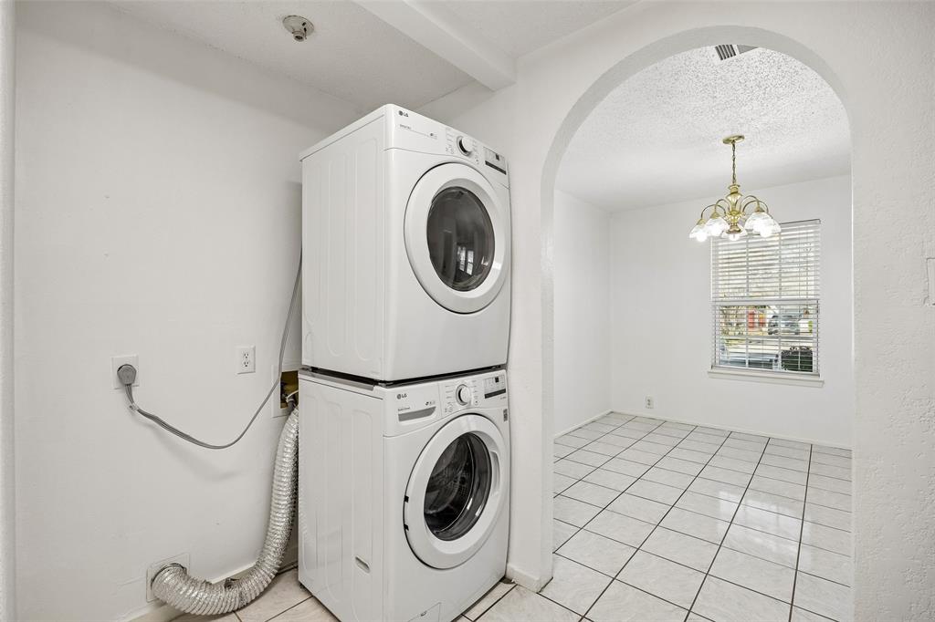 Laundry located in the kitchen.