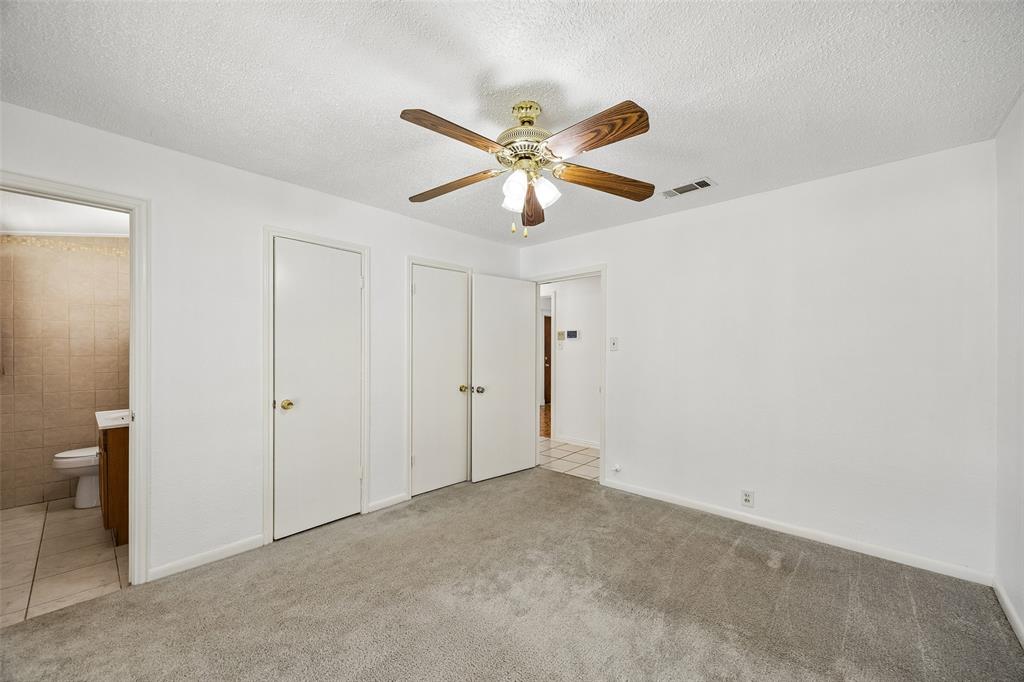 Primary bedroom with ensuite powder bathroom. Primary bedroom with ensuite powder bathroom.