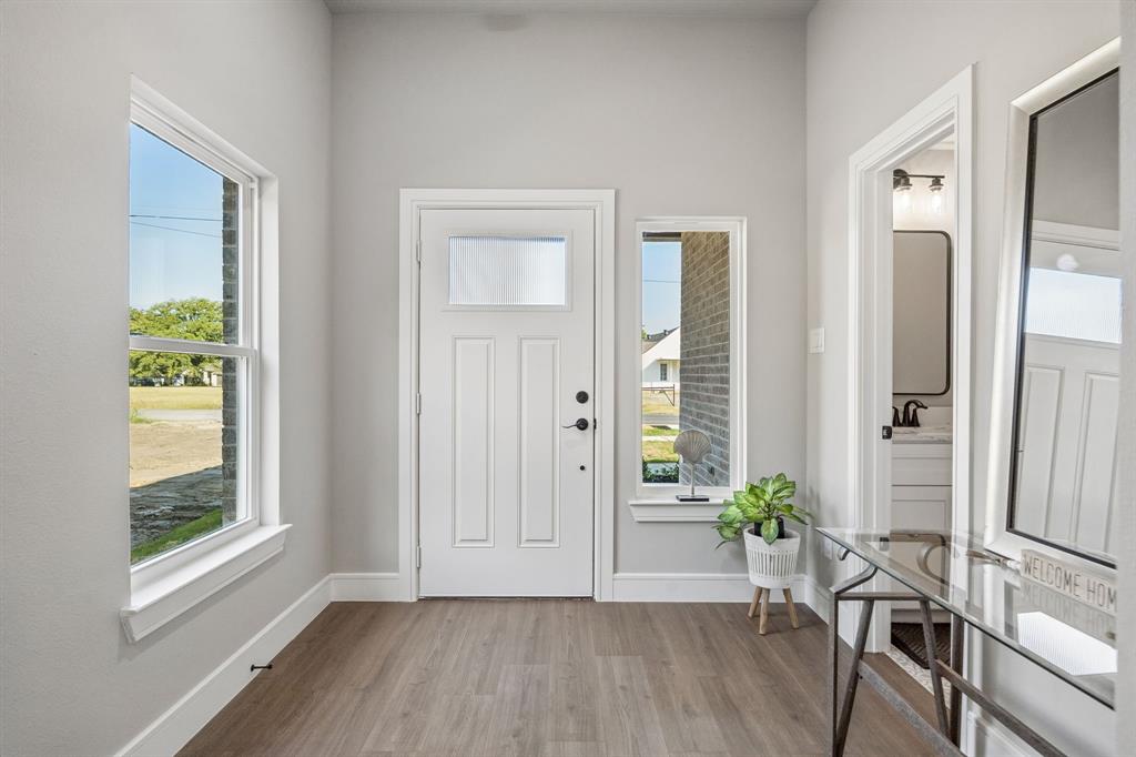 407 Frank bright foyer with half bath front of house