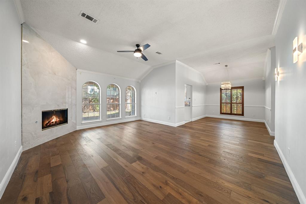 View of living room and dining room, gorgeous wood flooring