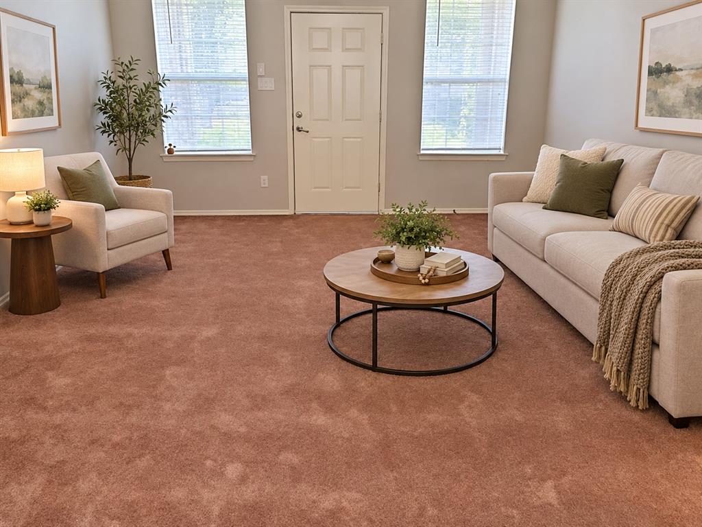 Wall-to-wall carpeting, two dual-pane windows with horizontal blinds, and a paneled entry door Wall-to-wall carpeting, two dual-pane windows with horizontal blinds, and a paneled entry door