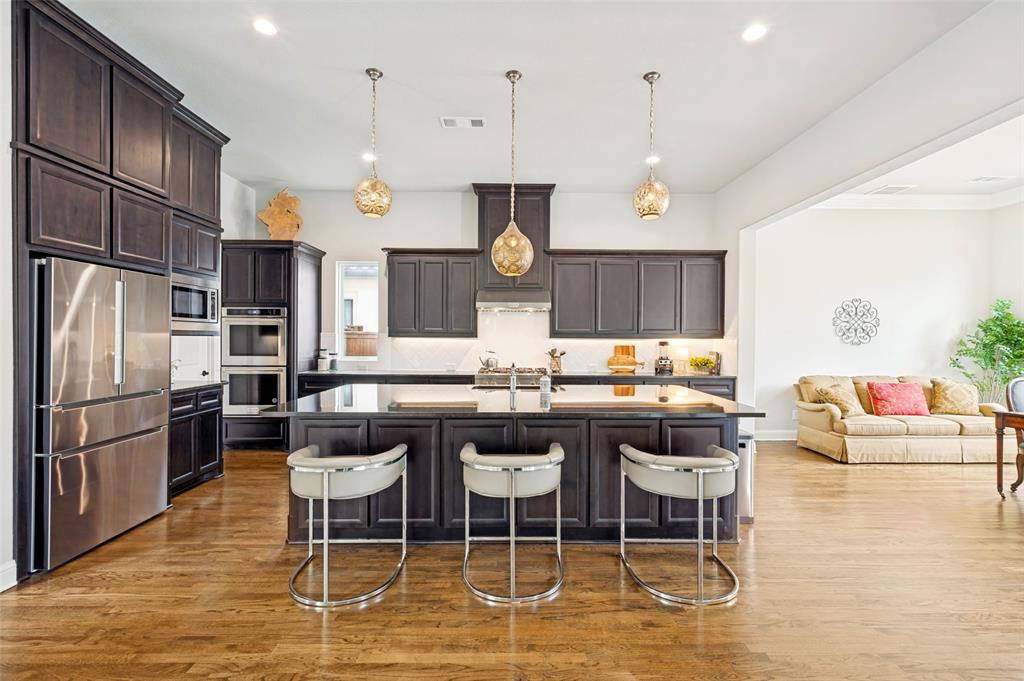 Spacious kitchen and open spacious dining area with backyard views is an ideal plan.