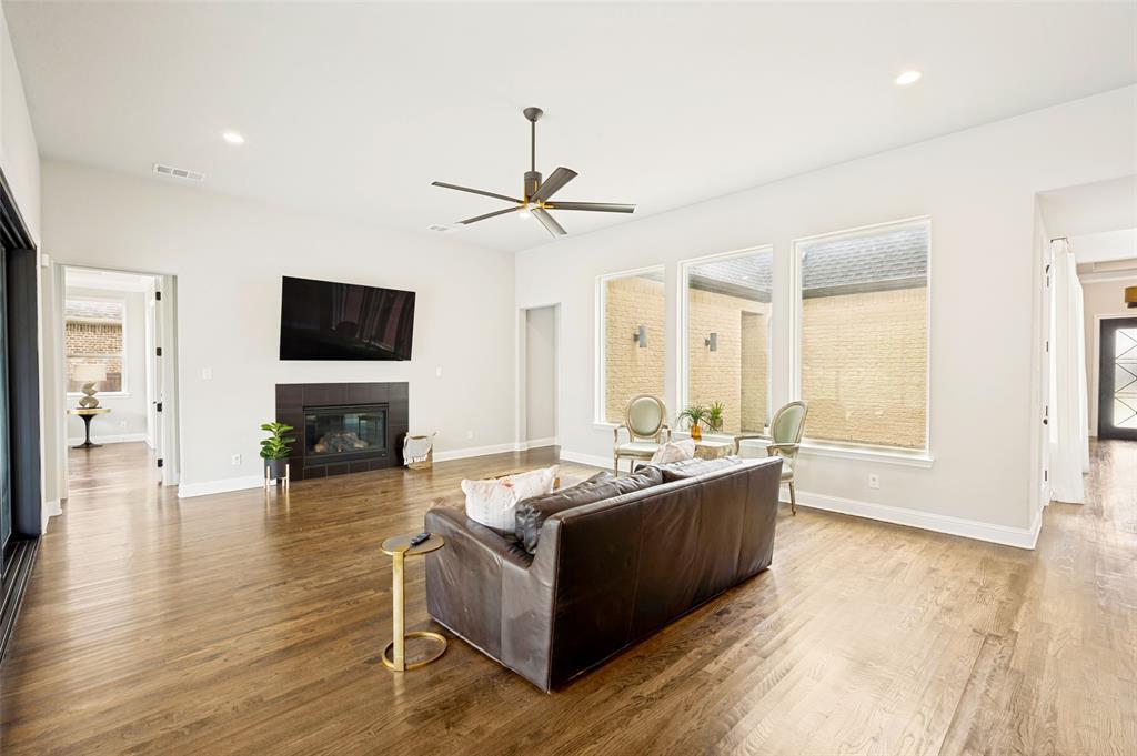 The living area truly is the heart of the home and allows views throughout the home to the backyard and the private courtyard.