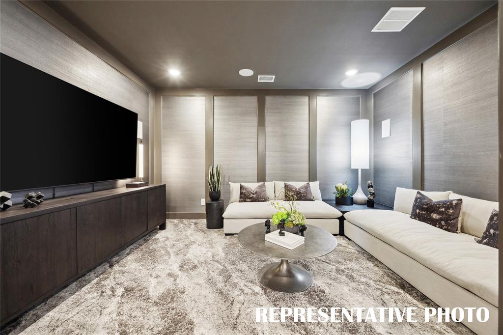 With a main floor media room, our Sophie plan offers outstanding entertaining spaces.  REPRESENTATIVE PHOTO