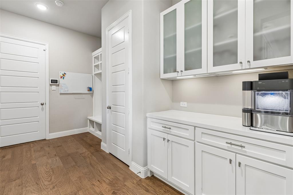 Would you look at that mudroom with added cabinetry!