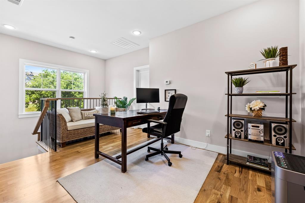 Home office featuring wood-type flooring
