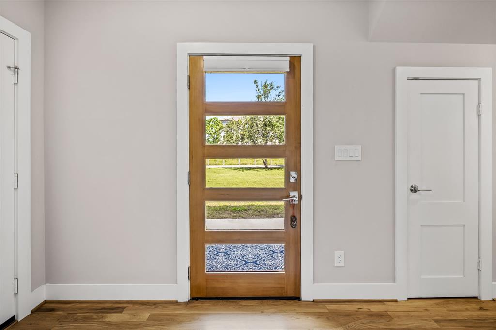 Doorway featuring hardw