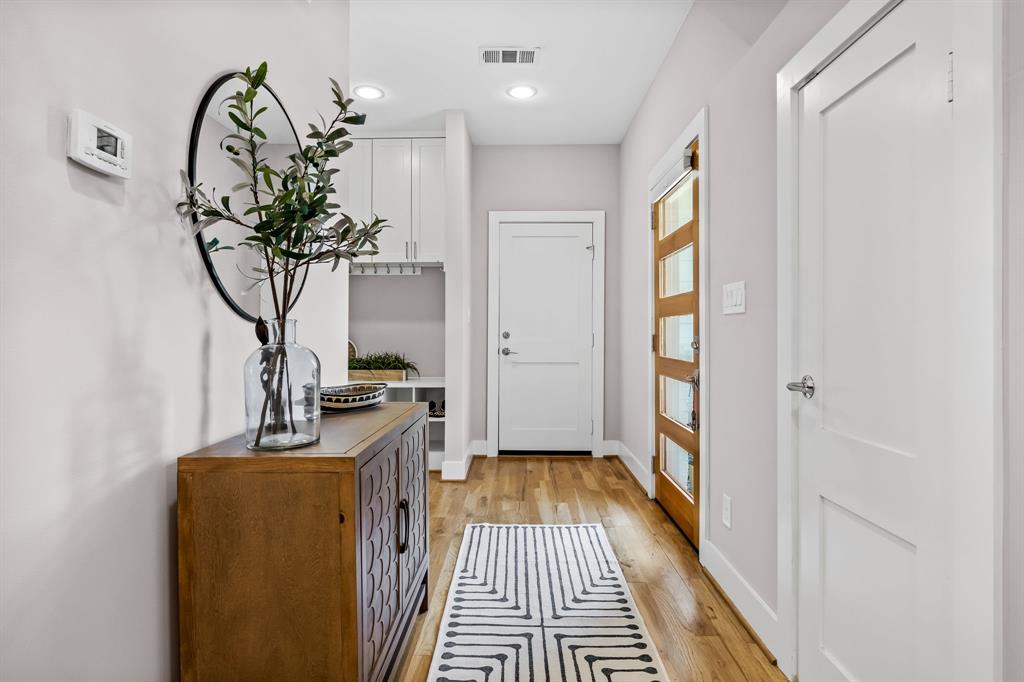 Entryway with light hardwood / wood-style floors