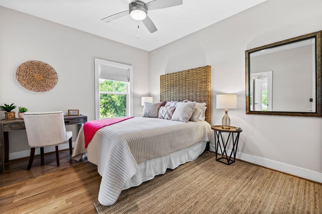 Bedroom featuring ceiling fan and light wood-type flooring