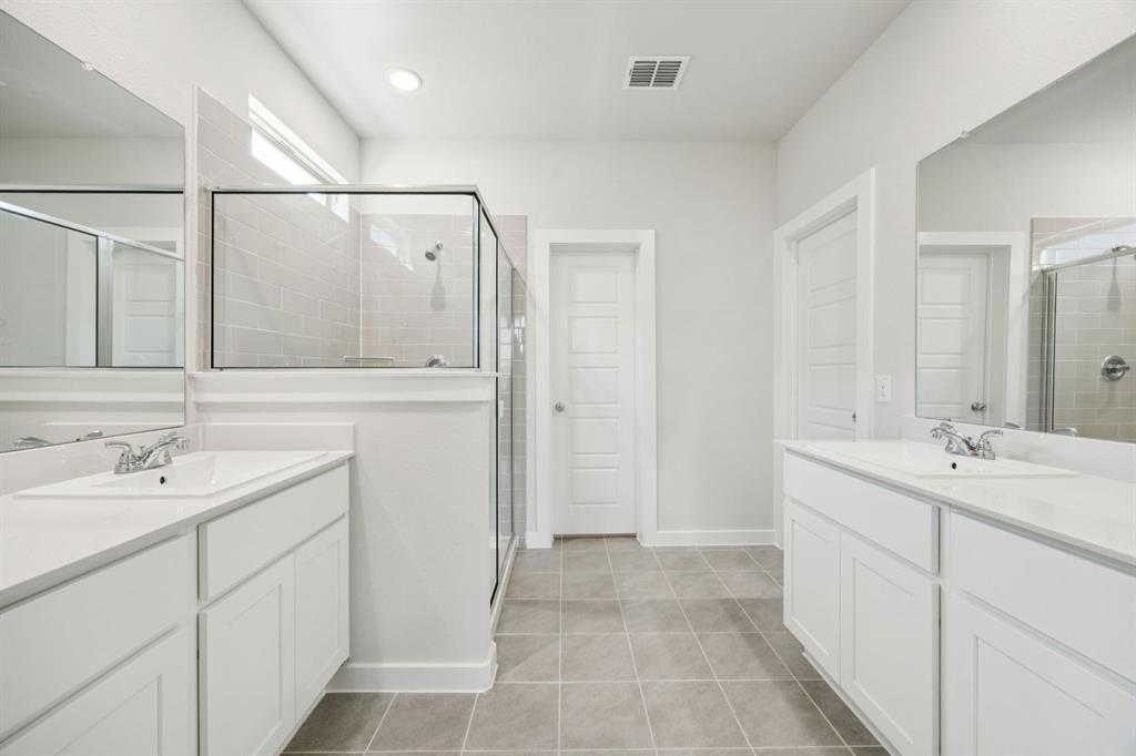 Primary Bathroom in the Masters home plan – REPRESENTATIVE PHOTO