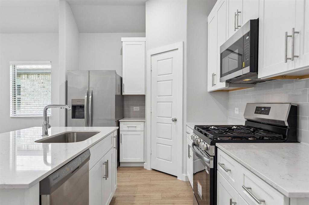 Kitchen in the Cypress home plan - REPRESENTATIVE PHOTO