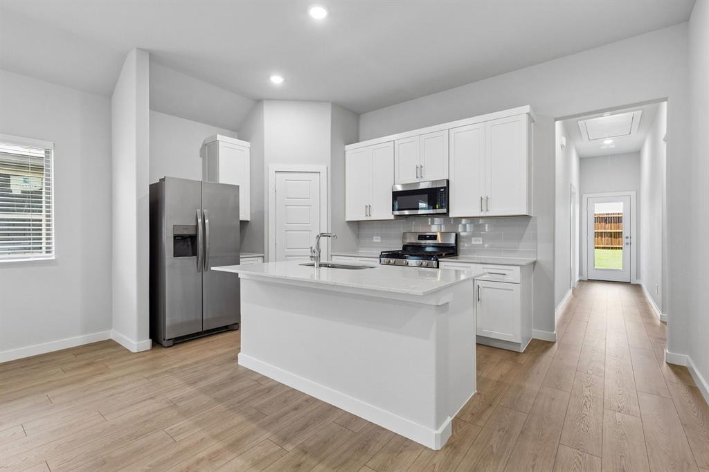 Kitchen in the Cypress home plan - REPRESENTATIVE PHOTO