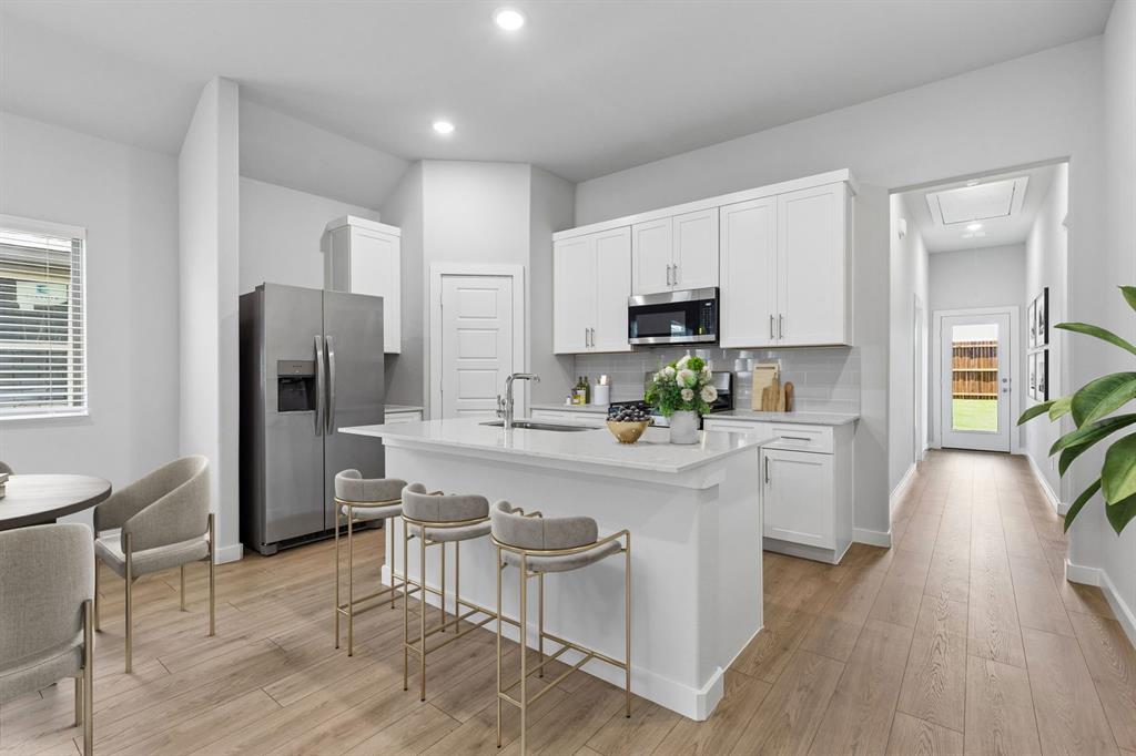 Kitchen in the Cypress home plan - REPRESENTATIVE PHOTO