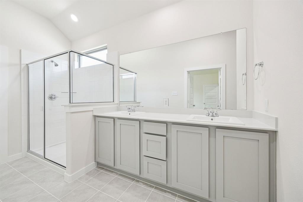 Primary Bathroom in the Claret home plan – REPRESENTATIVE PHOTO