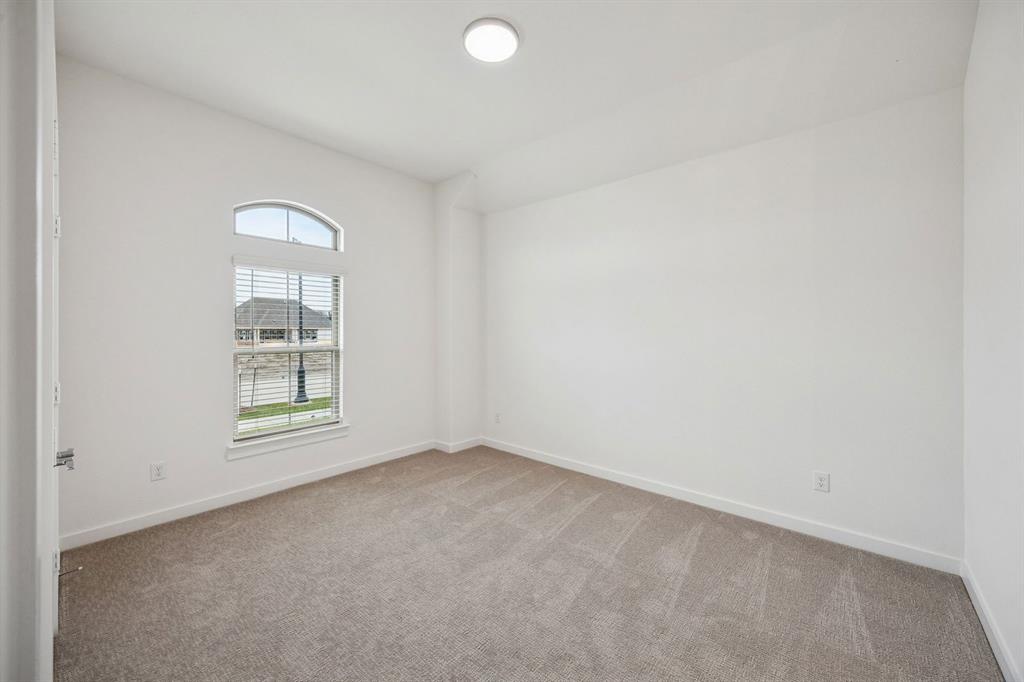 Bedroom in the Gilmour II home plan – REPRESENTATIVE PHOTO