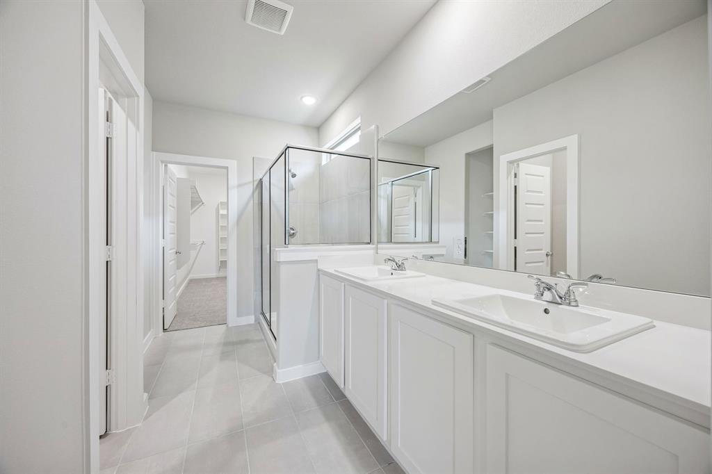 Primary Bathroom in the Willow home plan – REPRESENTATIVE PHOTO