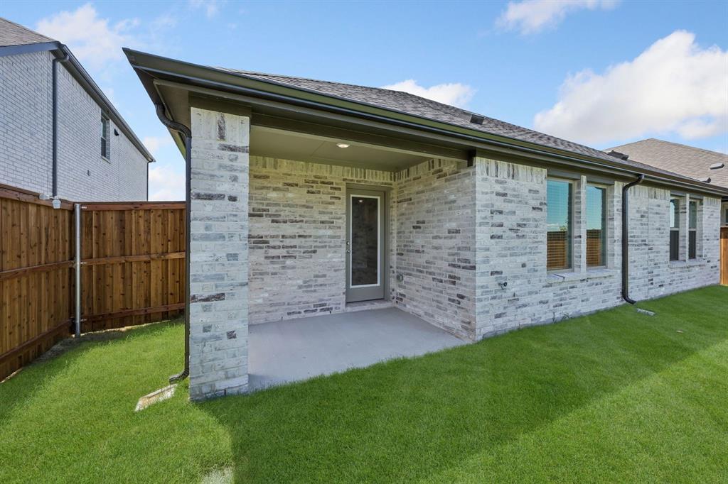 Covered patio in the Heisman home plan – REPRESENTATIVE PHOTO