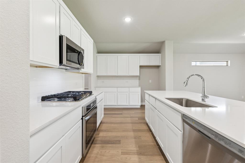 Kitchen in the Heisman home plan – REPRESENTATIVE PHOTO Kitchen in the Heisman home plan – REPRESENTATIVE PHOTO