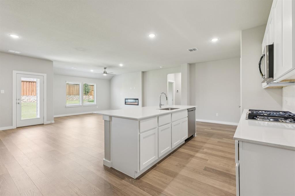 Open Floorplan in the Heisman home plan – REPRESENTATIVE PHOTO Open Floorplan in the Heisman home plan – REPRESENTATIVE PHOTO