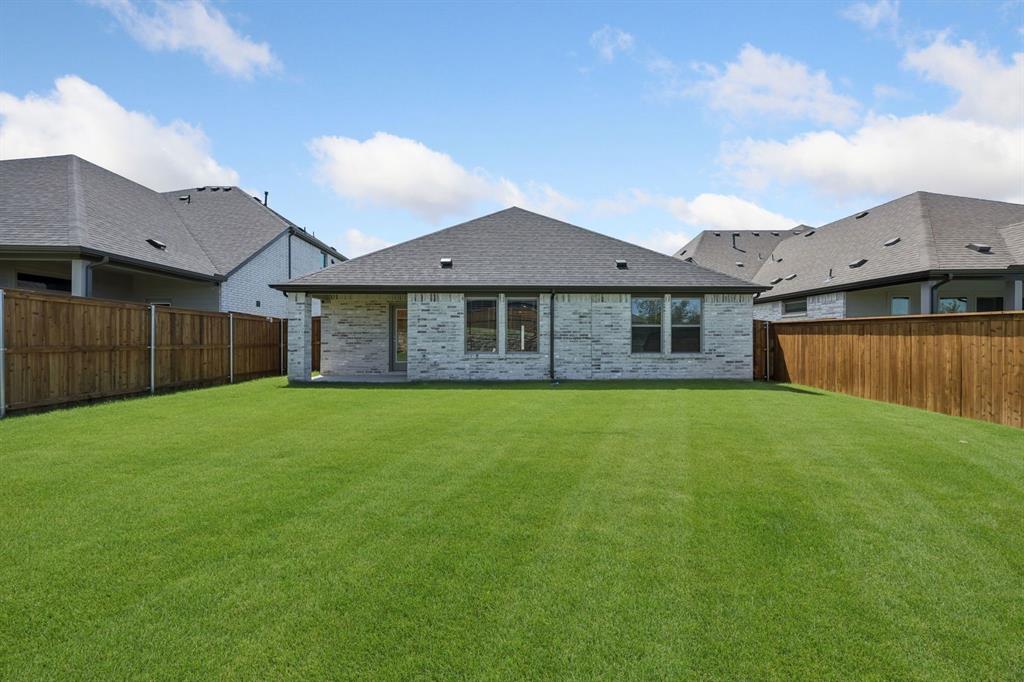 Covered patio in the Heisman home plan – REPRESENTATIVE PHOTO
