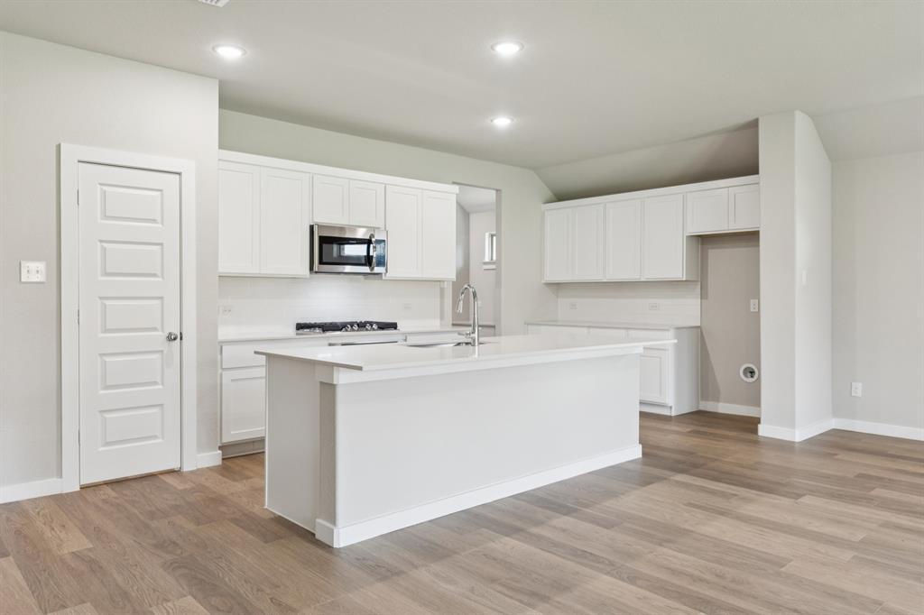 Kitchen in the Heisman home plan – REPRESENTATIVE PHOTO Kitchen in the Heisman home plan – REPRESENTATIVE PHOTO