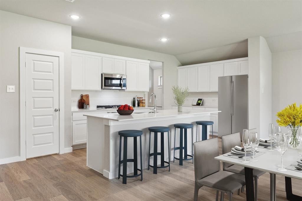 Kitchen in the Heisman home plan – REPRESENTATIVE PHOTO Kitchen in the Heisman home plan – REPRESENTATIVE PHOTO