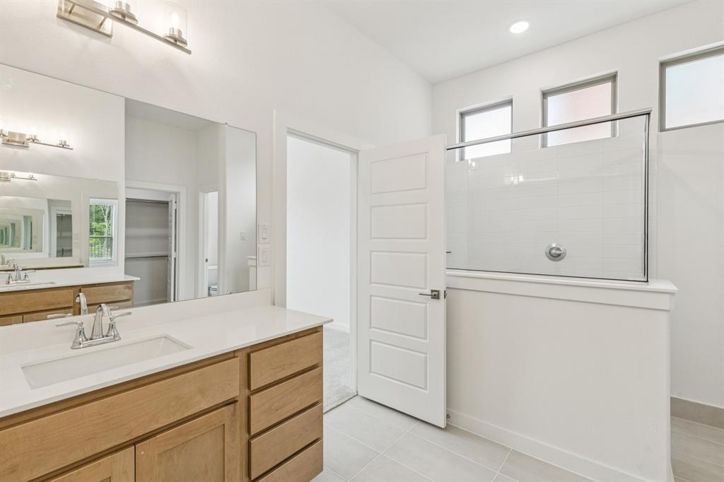 Primary Bathroom in the Da Vinci II home plan – REPRESENTATIVE PHOTO