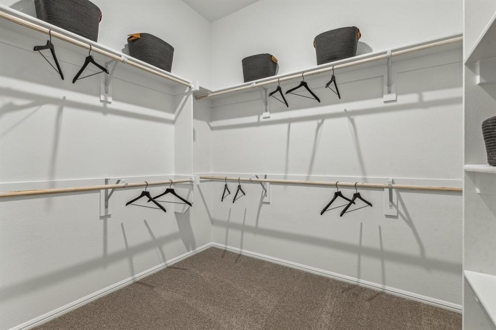 Primary Closet in the Turquoise home plan – REPRESENTATIVE PHOTO