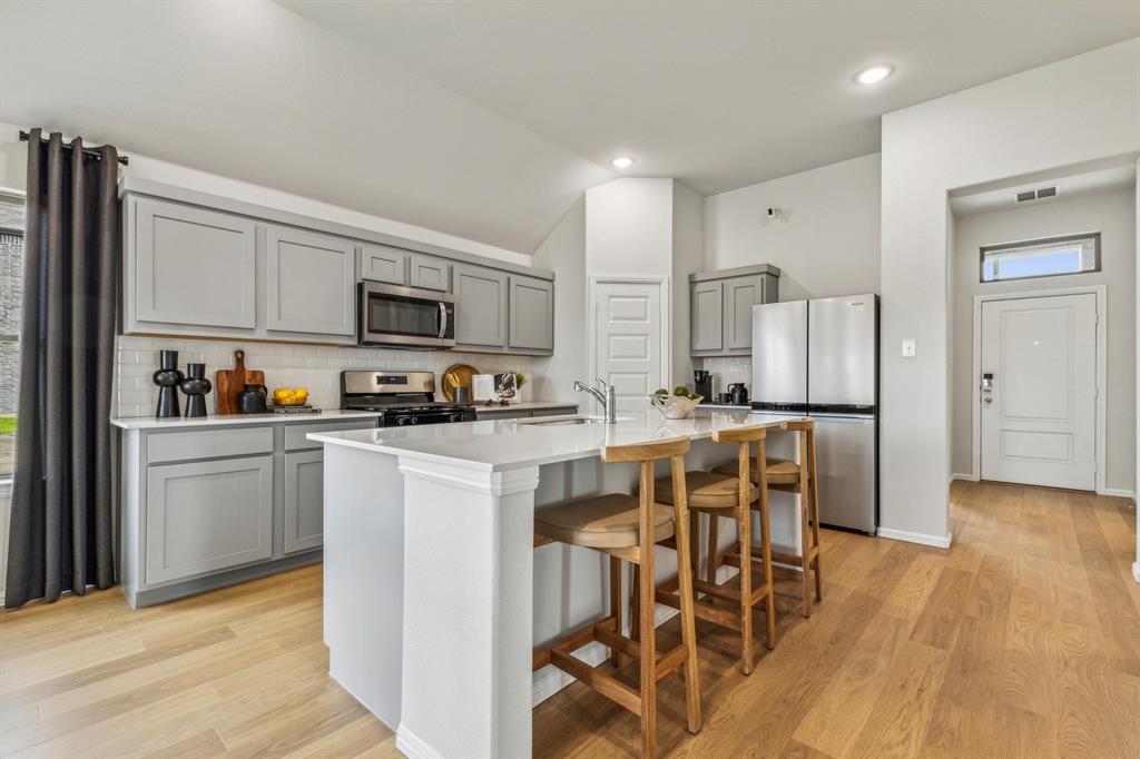 Kitchen in the Turquoise home plan – REPRESENTATIVE PHOTO