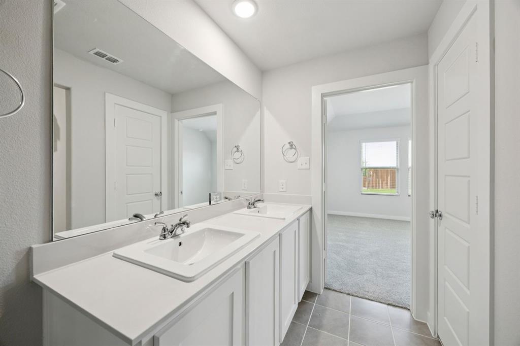 Primary Bathroom in the Hadley home plan – REPRESENTATIVE PHOTO