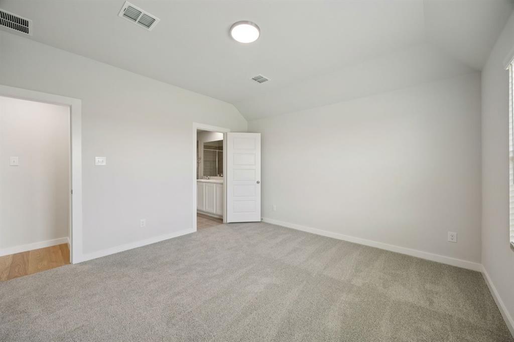 Primary Suite in the Hadley home plan – REPRESENTATIVE PHOTO