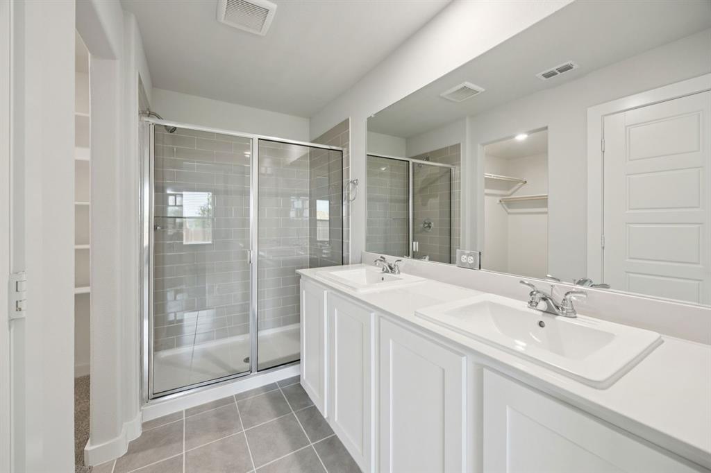 Primary Bathroom in the Hadley home plan – REPRESENTATIVE PHOTO