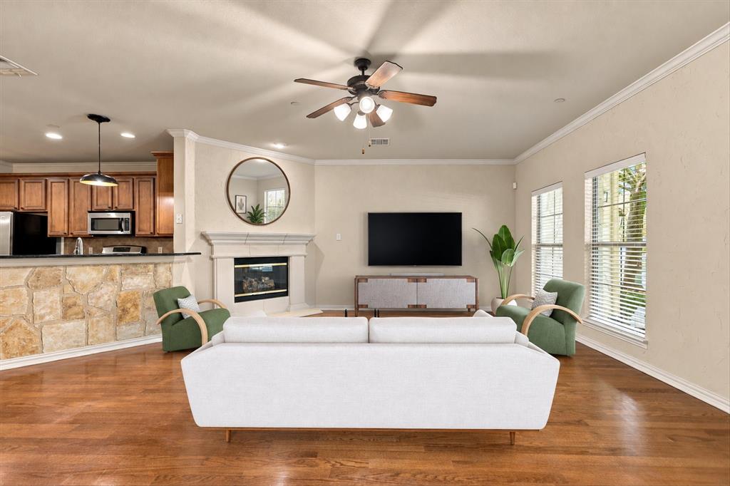 Picture yourself curled up by the fireplace, reading a book, or watching your favorite movie. All of the comforts of home await in this luxurous, low maintenance townhome. Virtual Staging.